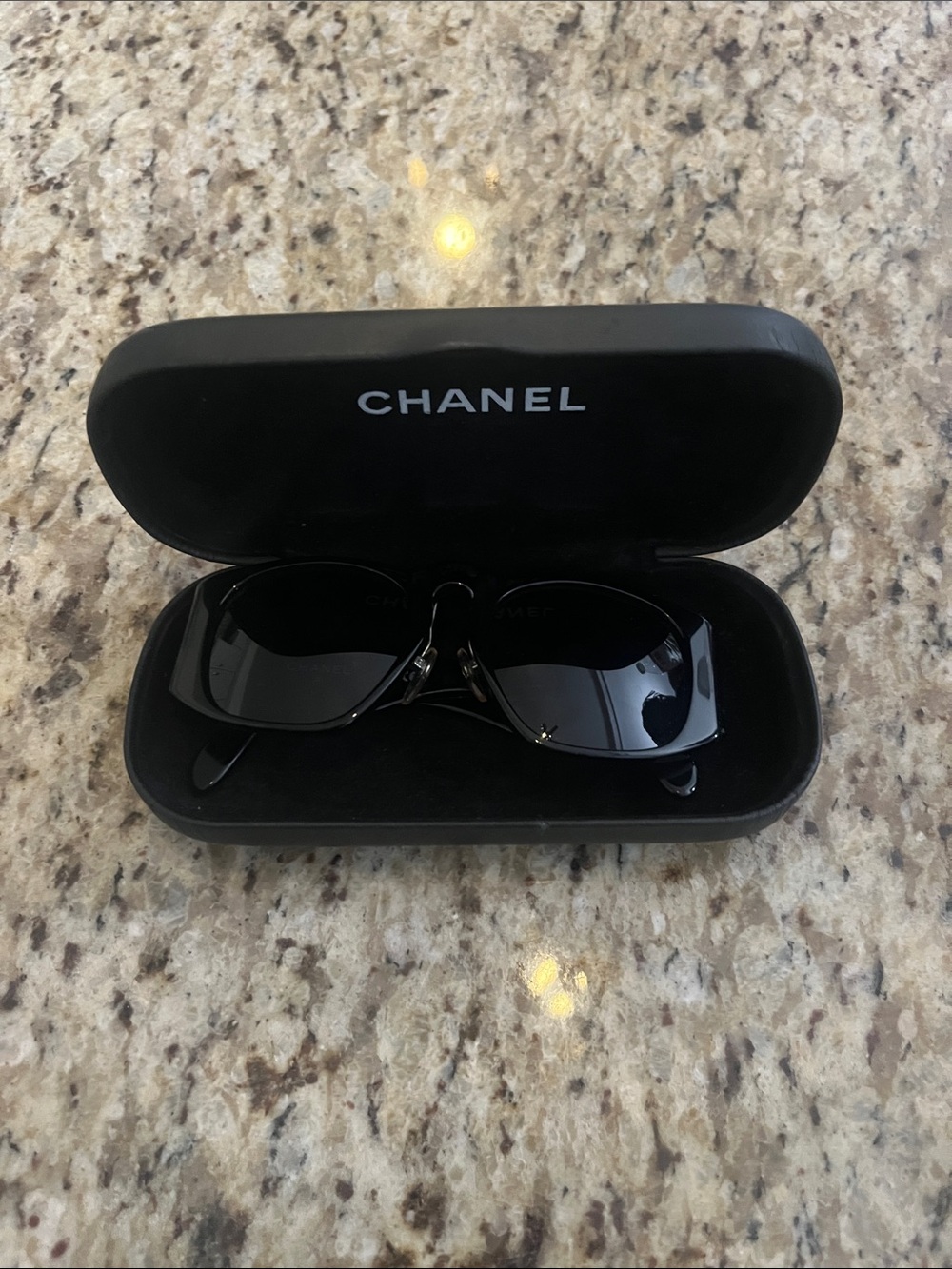 CHANEL Black Rimless Sunglasses in Branded Case